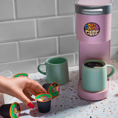 Crazy Cups pod in Keurig-style brewer mid-brew illustrating easy hot coffee preparation