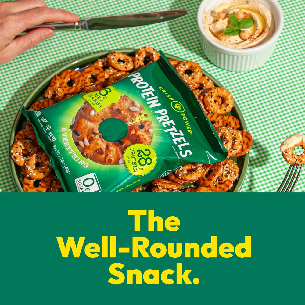 Crisp Power pretzel beside a measuring tape to show serving size and scale