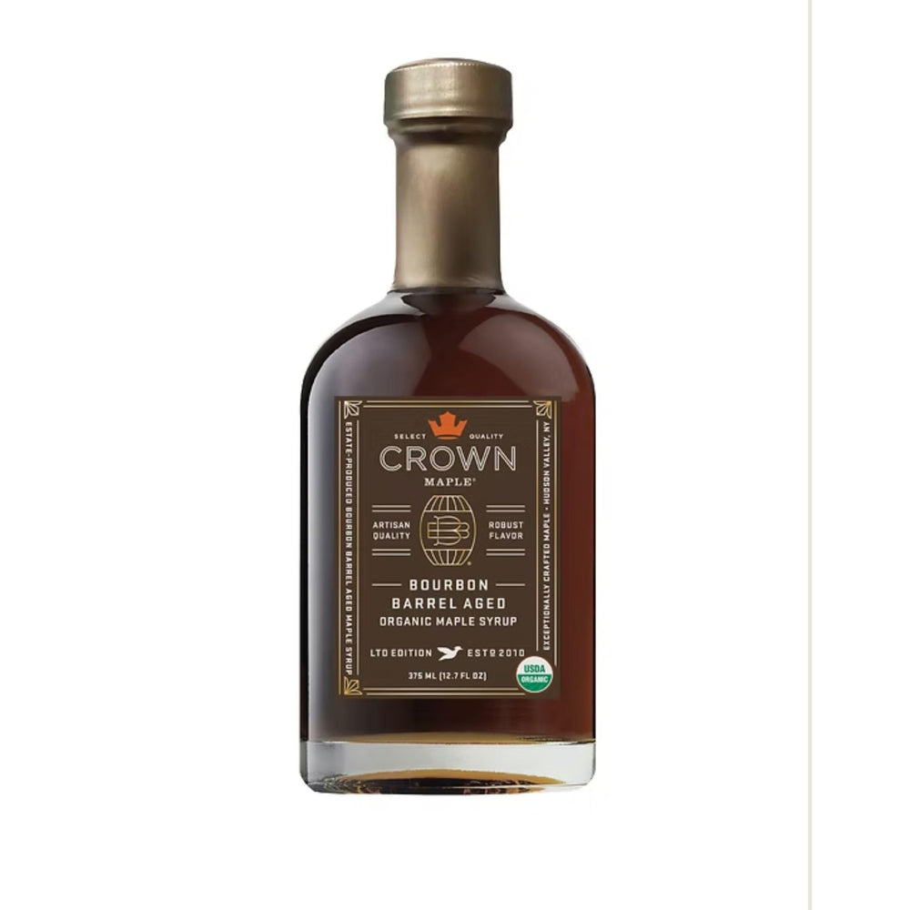 Crown Maple bottle front view showing elegant packaging and premium appeal