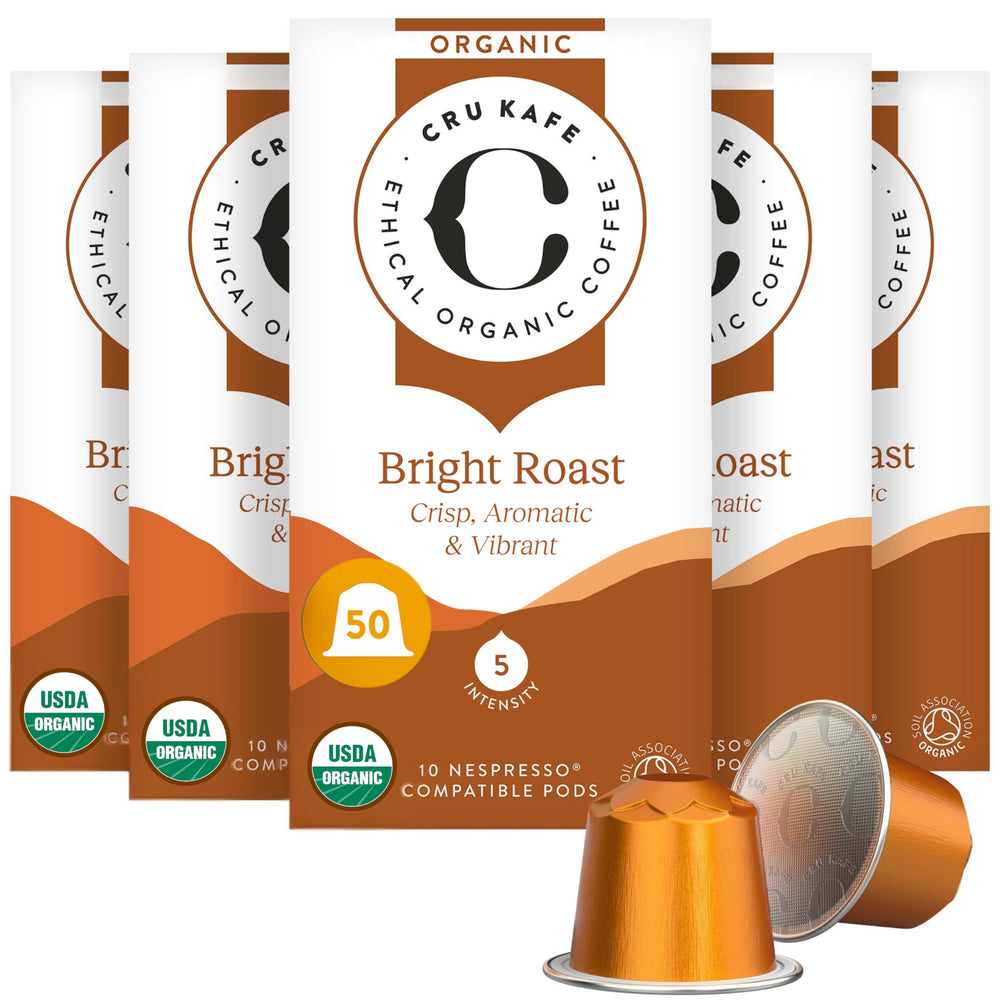 Cru Kafe front packaging showing bright roast pods and organic badge, appealing presentation