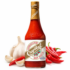Crystal bottle front packaging showing label and garlic-enhanced cayenne flavor benefit