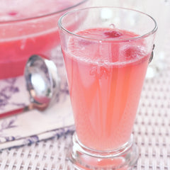 Crystal Light poured in a pitcher and glass with ice, refreshing low-calorie drink