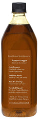Daana 34 oz bottle beside common kitchen items for scale, clarifying bottle size