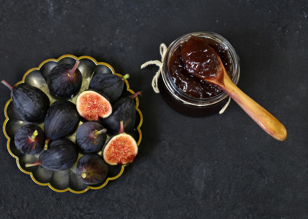 Dalmatia fig spread on cheese board pairing with cheeses for enhanced flavor