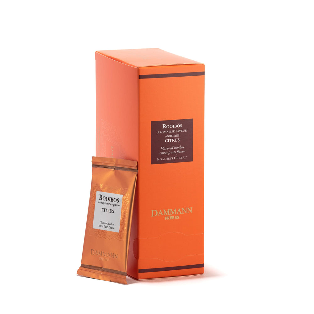 Dammann Frères box front showing orange citrus-themed design and premium packaging benefit