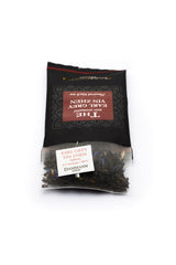 Dammann Freres close-up of a Cristal sachet revealing white tips and petals for refined flavor