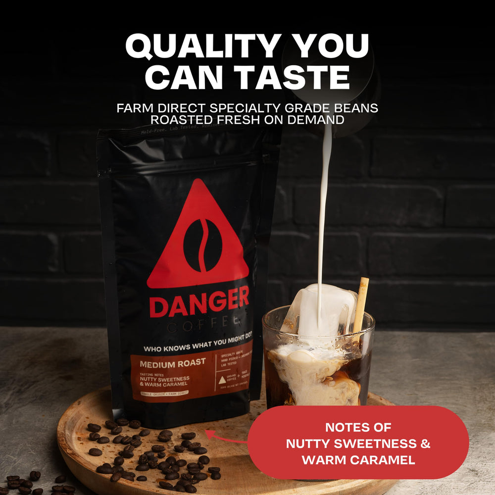 Danger Coffee brewed cup top view, displays caramel color and aroma