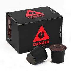 Danger Coffee front packaging showing compostable pods and eco benefits