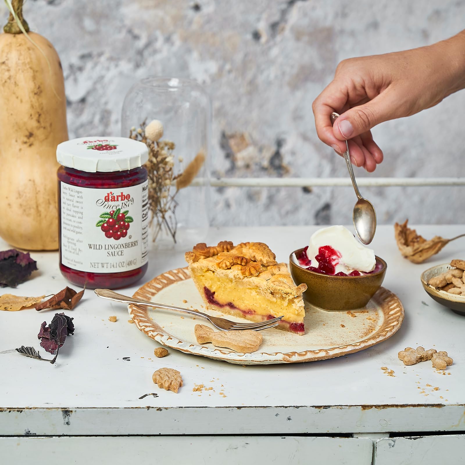 Darbo lingonberry glaze brushed over roasted meat, enhances savory dishes