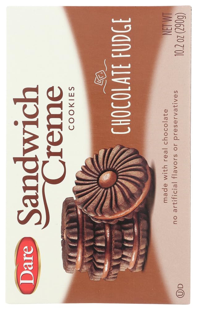 Hand holding a Dare cookie demonstrating portion size and grab-and-go convenience