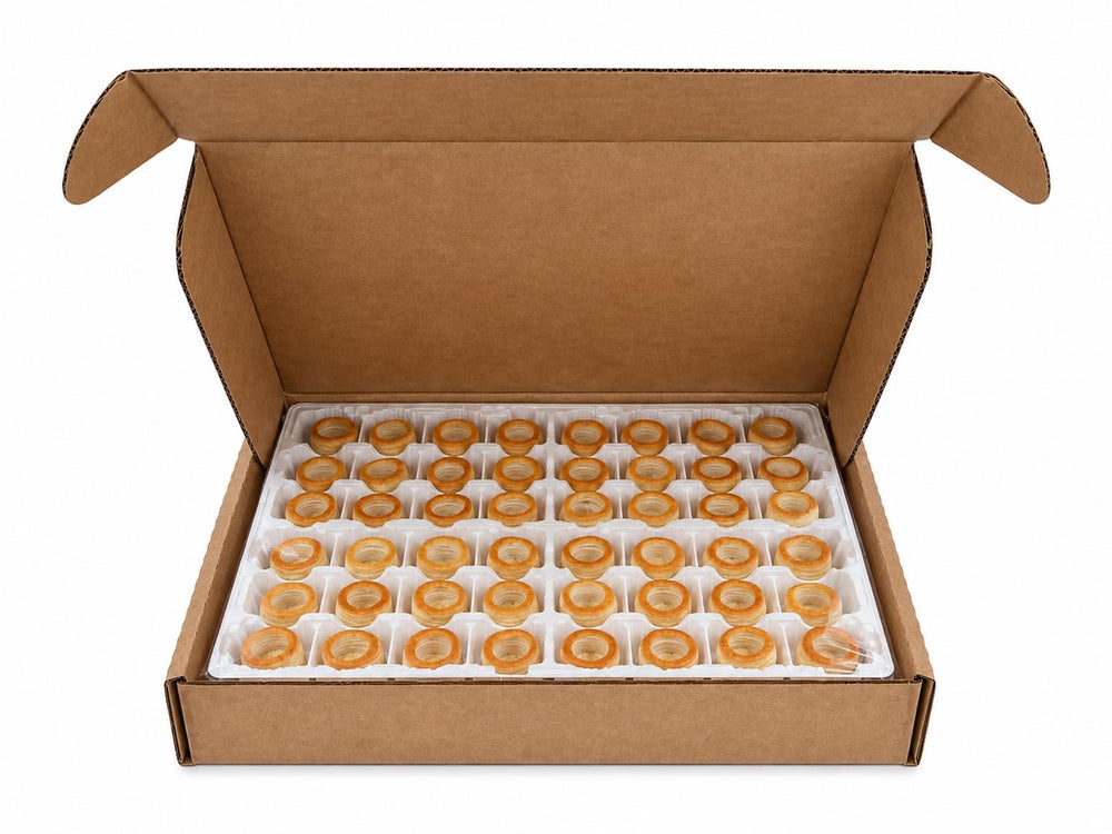 Dasher’s Spice & Beans tray of arranged pastry shells ready for rapid assembly at events