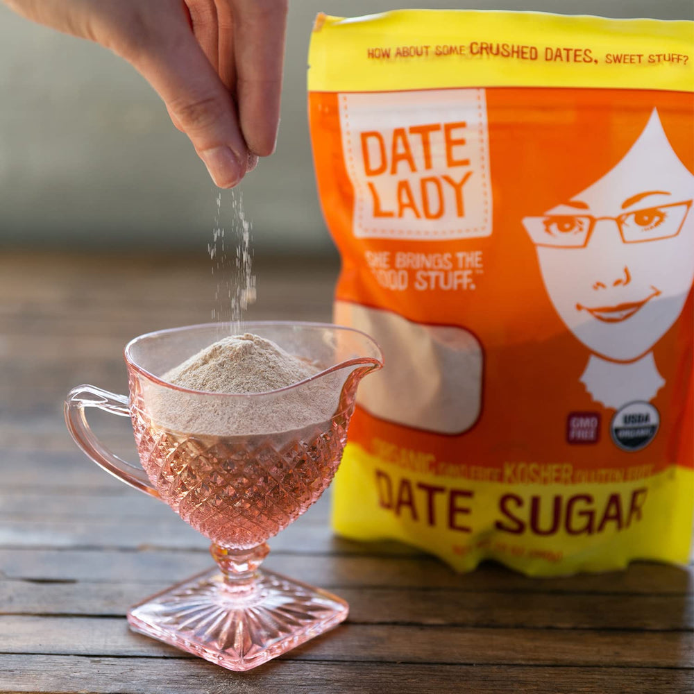 Date Lady jar on kitchen counter styled with baking props, suggests everyday baking use