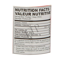 Datu Puti bottle beside a measuring cup to show 33.81 fl. oz. scale