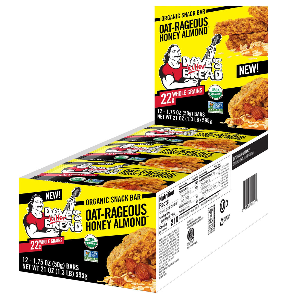 Dave's Killer Bread single unwrapped bar revealing oats and almonds, satisfying texture