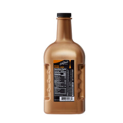 DaVinci Gourmet caramel sauce pour close-up adding consistent drizzle to drinks