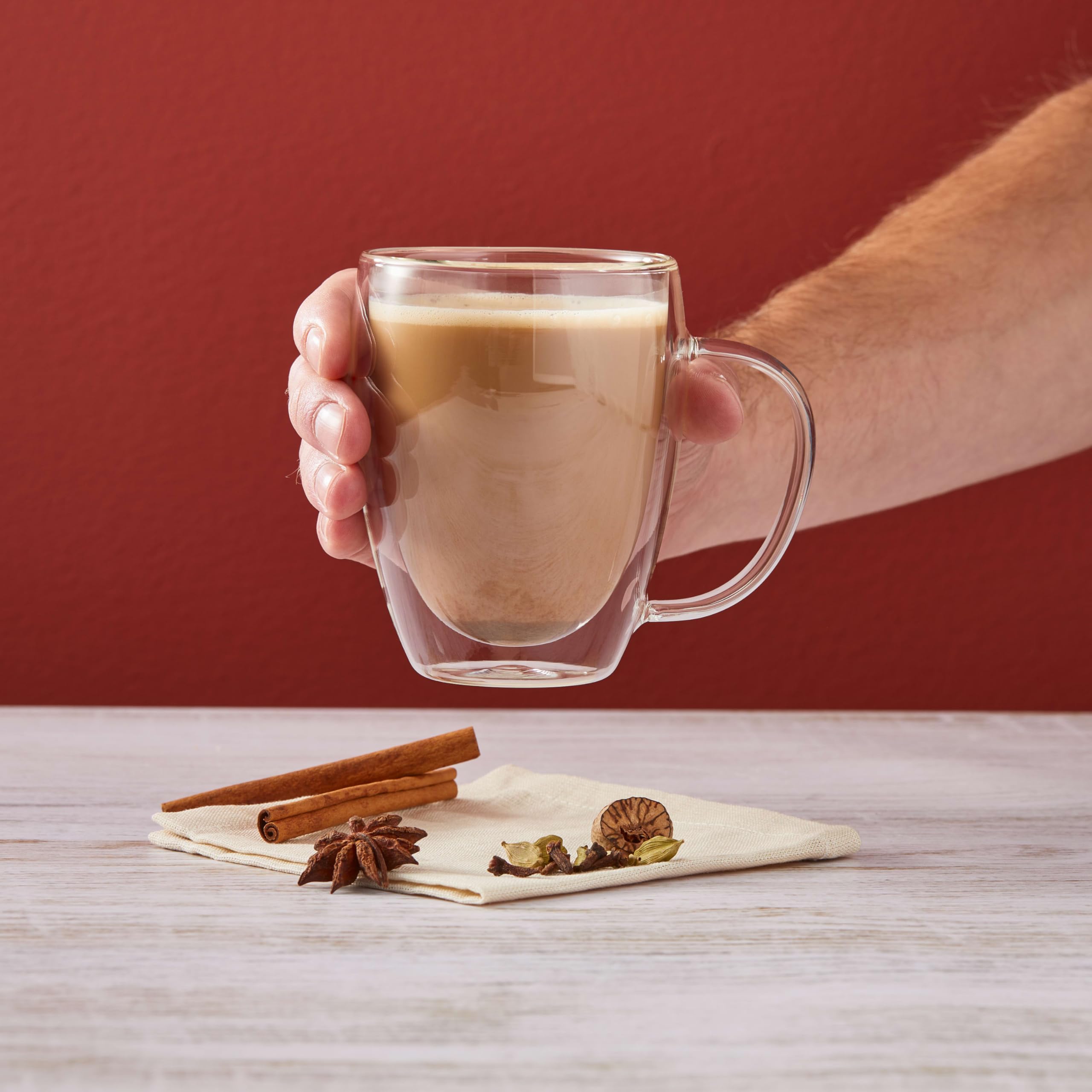 DaVinci Gourmet 3 lb pouch next to cup showing commercial size convenience