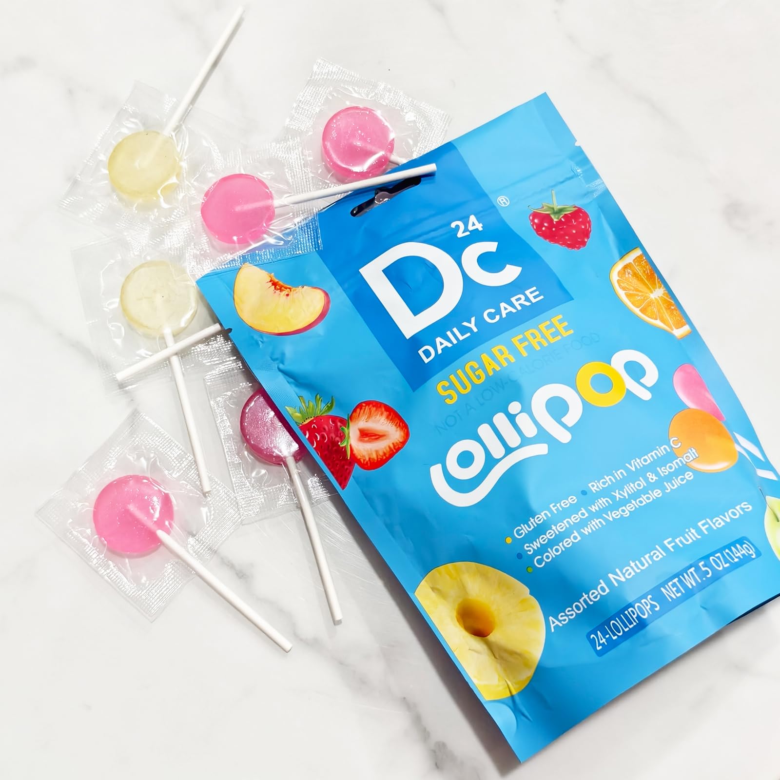 DC24 DAILY CARE flavor grid label showing six fruit varieties clearly