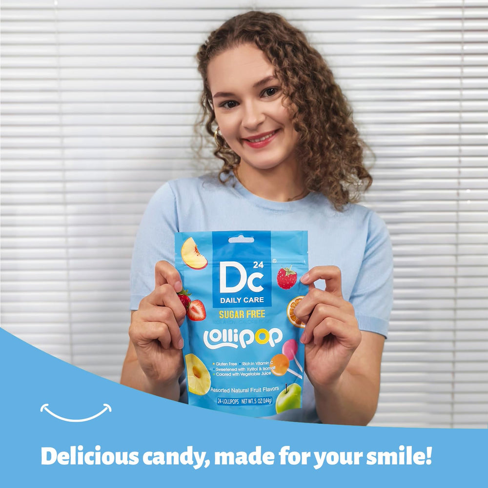 DC24 DAILY CARE lollipop held in hand showing real size and scale