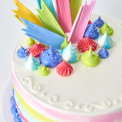 DecoPac nonpareils sprinkled on cupcake for professional finish