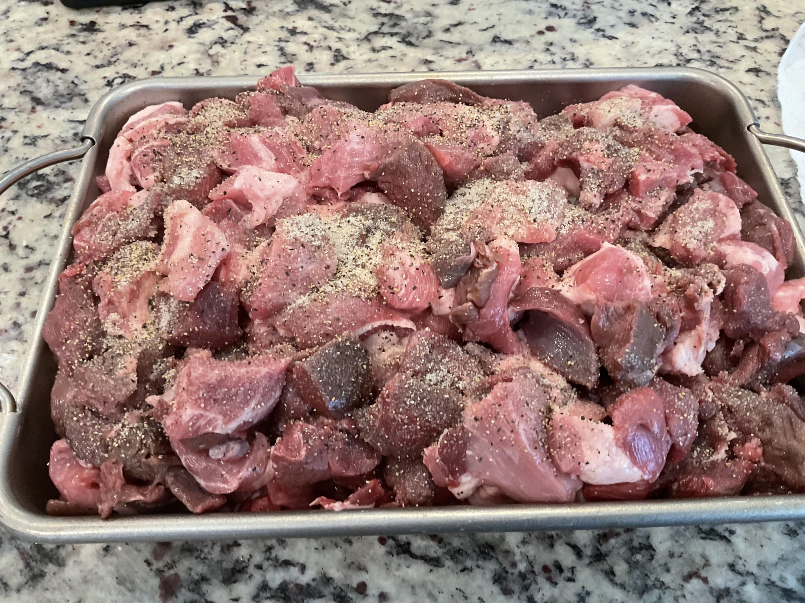 Deep Lake Trading Company mixing bowl with ground meat and seasoning, shows easy blending for consistent taste