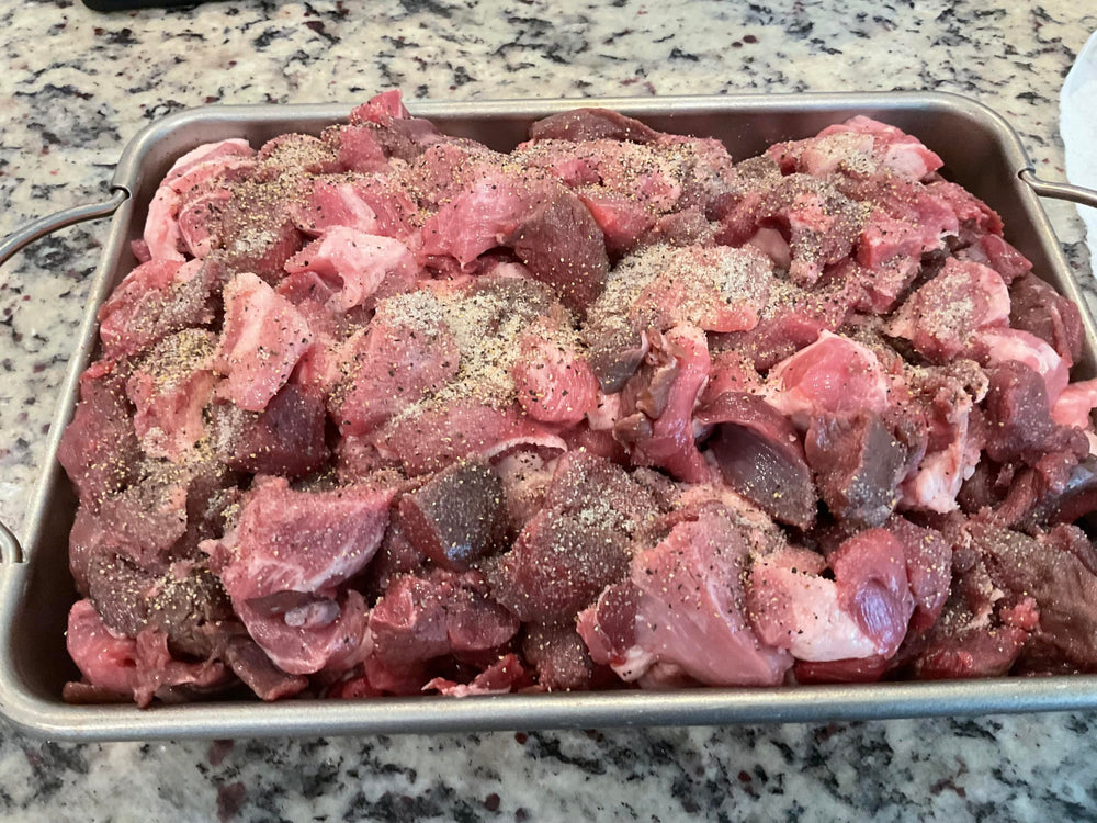 Deep Lake Trading Company mixing bowl with ground meat and seasoning, shows easy blending for consistent taste