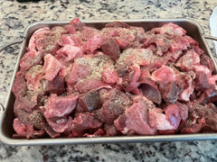 Deep Lake Trading Company mixing bowl with ground meat and seasoning, shows easy blending for consistent taste