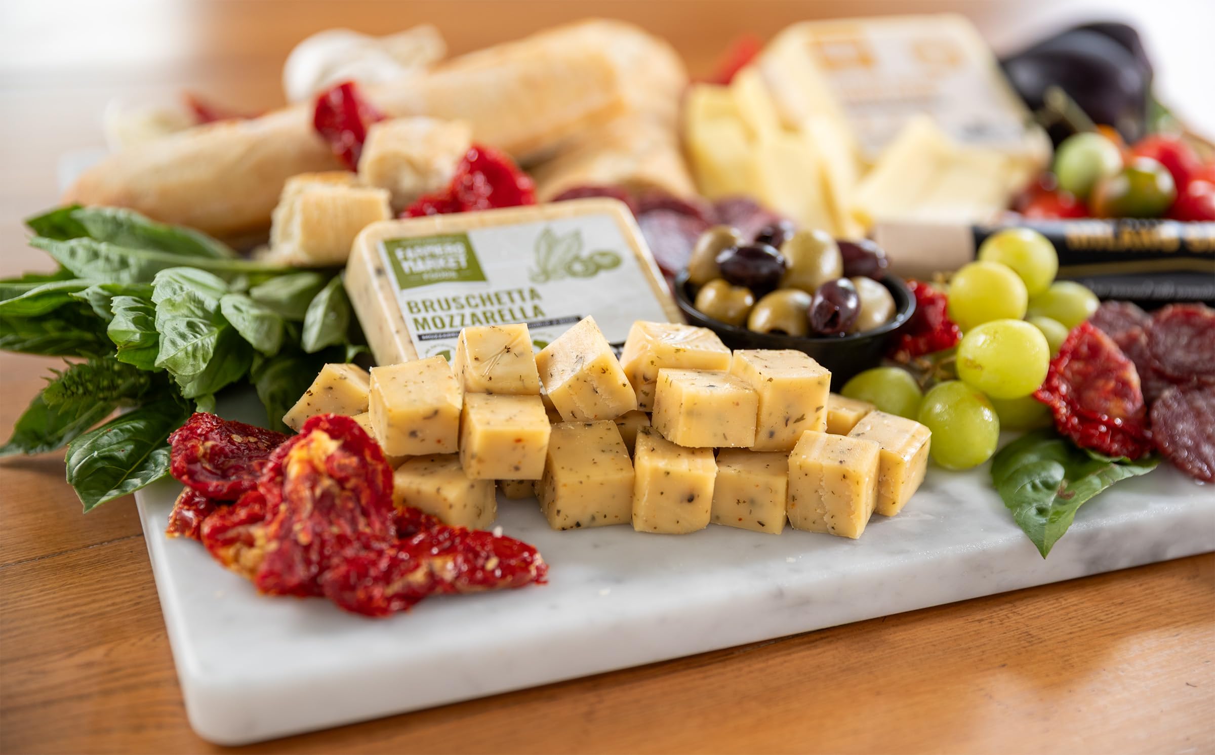 Deli Direct Bruschetta Mozzarella torn to show fresh, milky texture for recipes