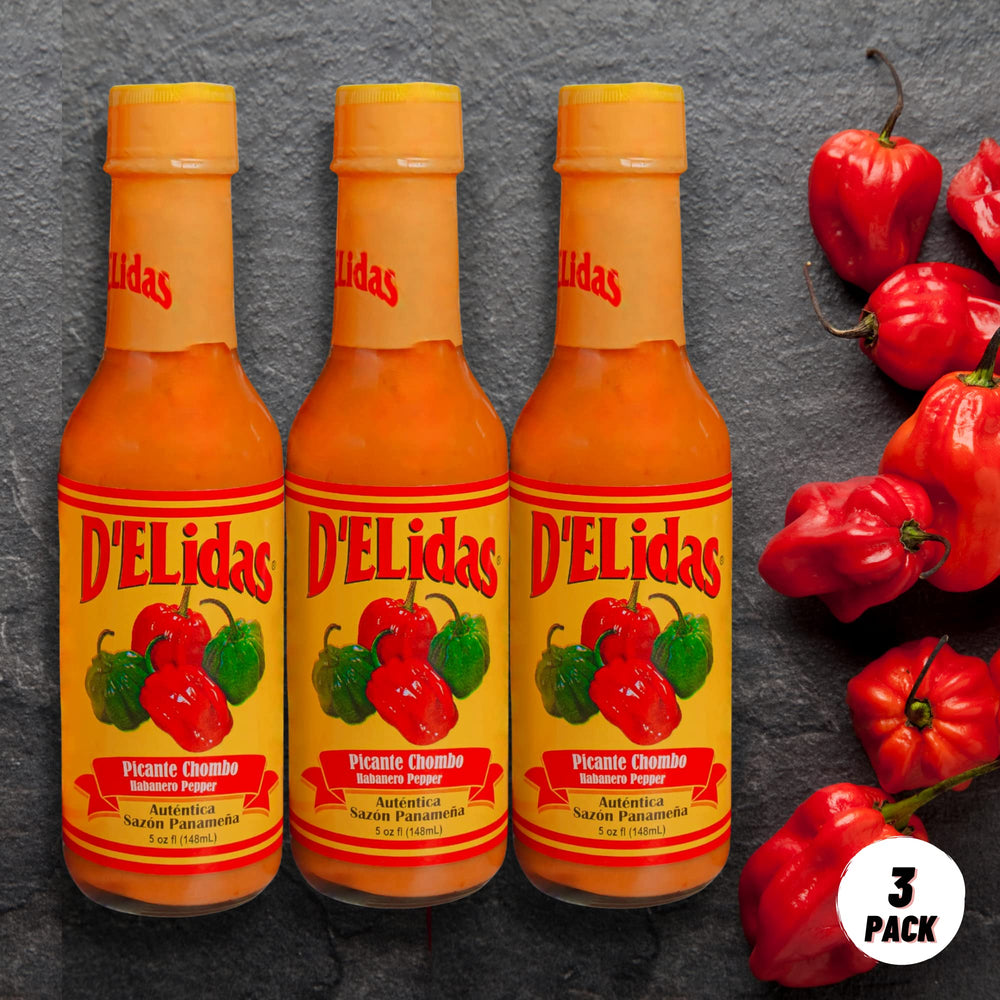 D'ELidas sauce texture pouring from bottle into spoon to show smooth, flavorful consistency