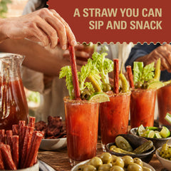 Demitri's straw placed on charcuterie board with cheese showing party-ready convenience