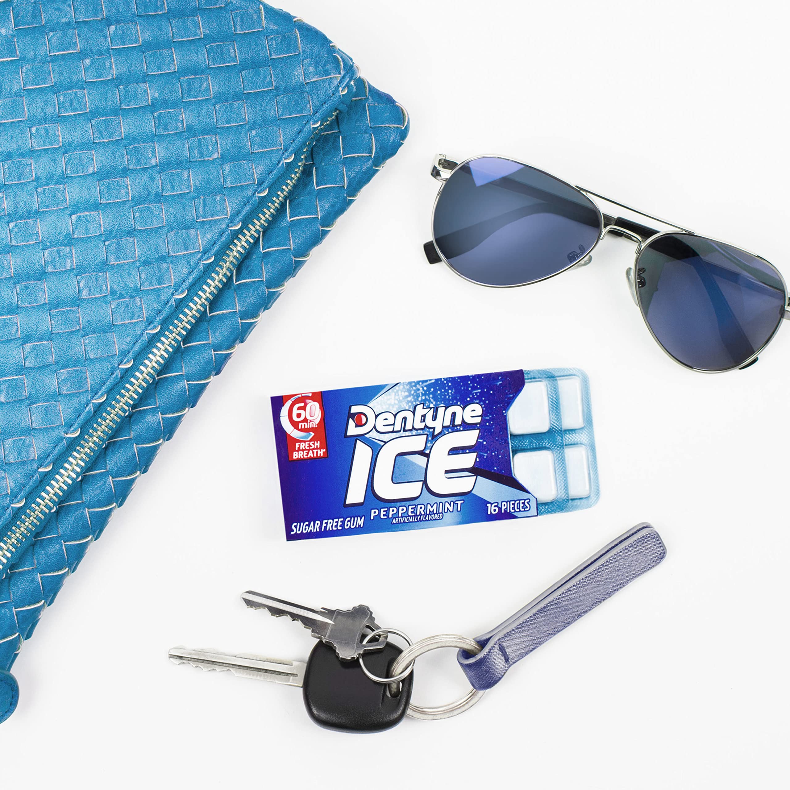 Dentyne pack beside smartphone to show compact, pocketable size
