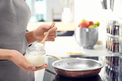 Desert Farms camel fat sizzling in a pan to crisp fries, provides high-heat stability