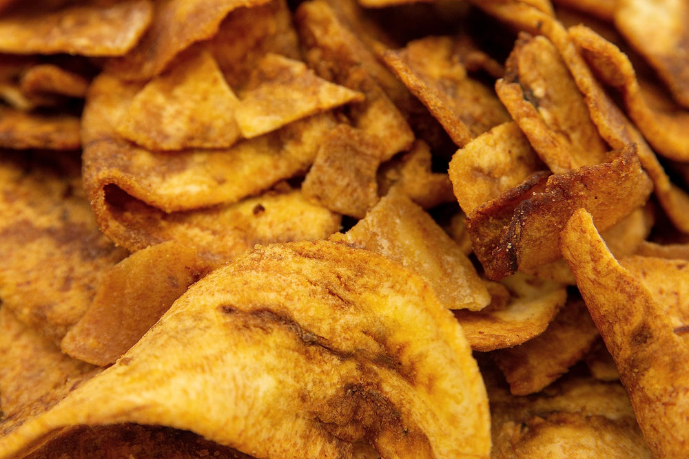Despensa Colombiana close-up of sweet plantain chips texture, highlighting crunchy caramelized edges