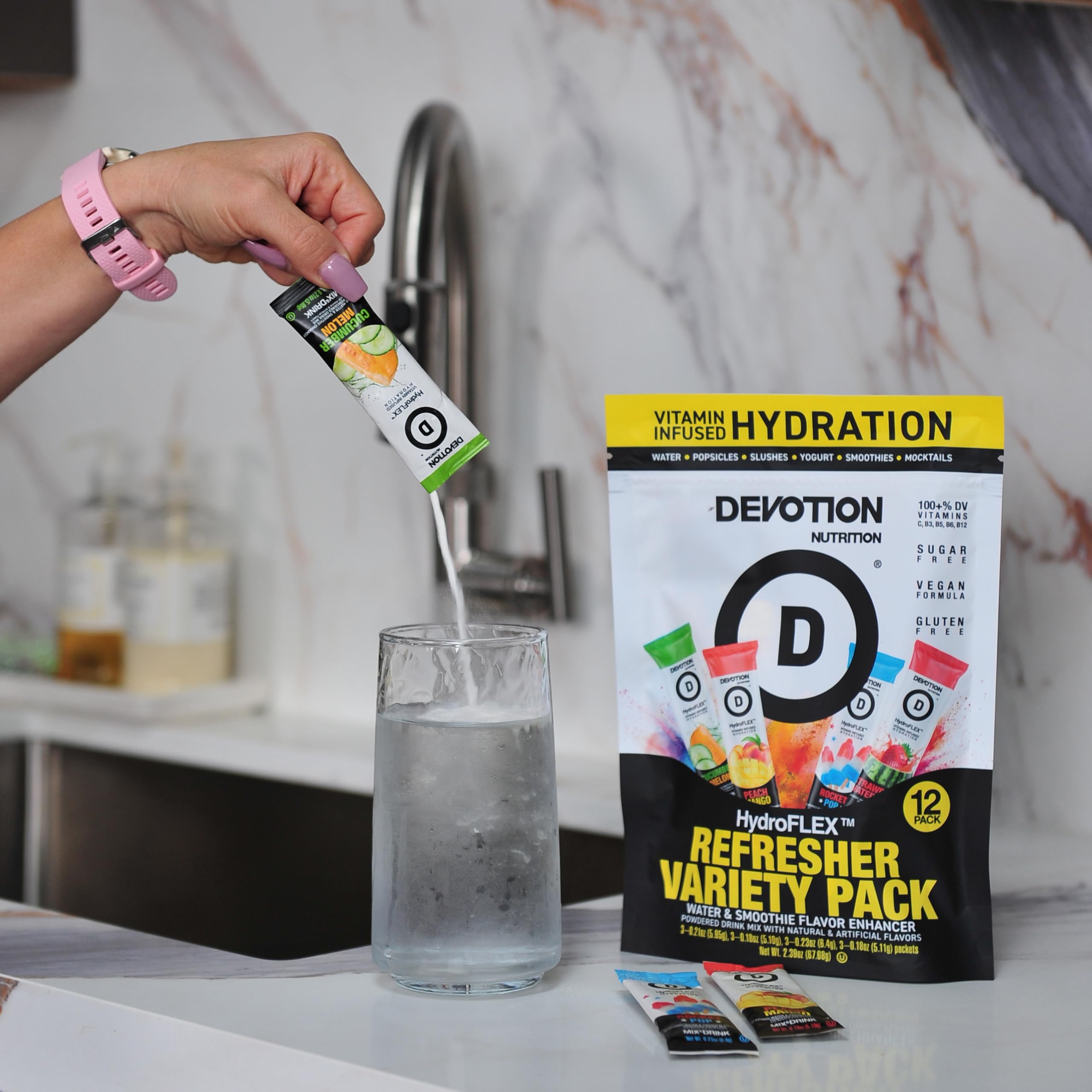 Devotion Nutrition HydrofLEX used outdoors with bottle showing portable flavor boost