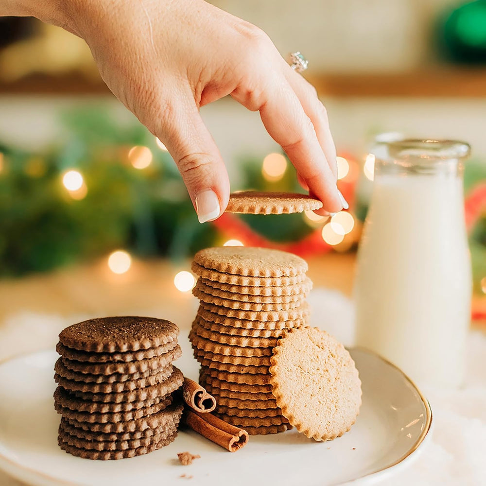Dewey's scale comparison in hand showing cookie size and portion control benefit
