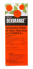Dexorange syrup being poured into a spoon demonstrating accurate dosing convenience