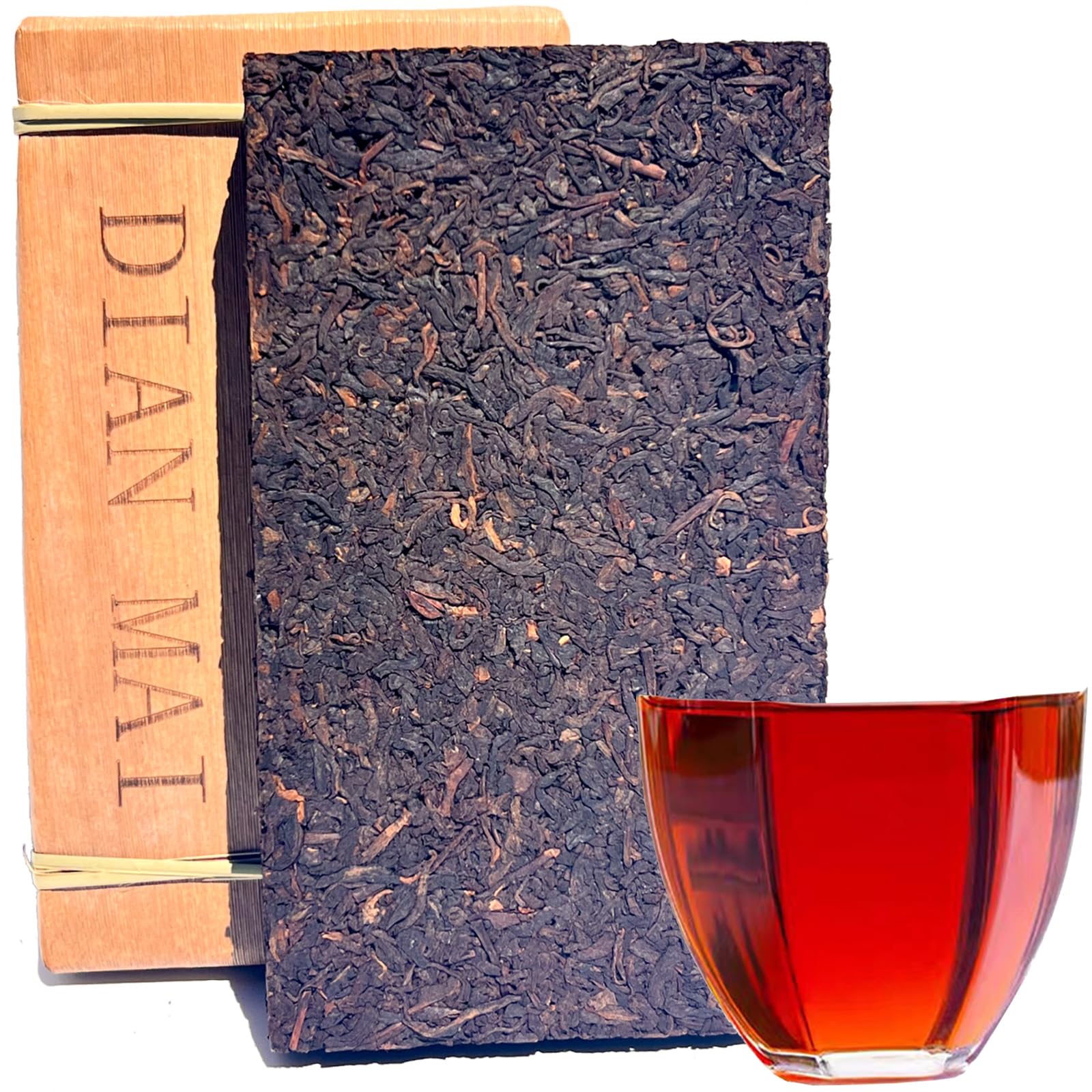 DIAN MAI HAO front packaging showing whole 500g pu'er brick and benefit of traditional preservation