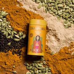 Diaspora Co spice blend pouring into bowl, showing easy use and rich color