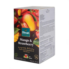Dilmah cup of hot brewed mango strawberry tea releasing bright aromatic steam