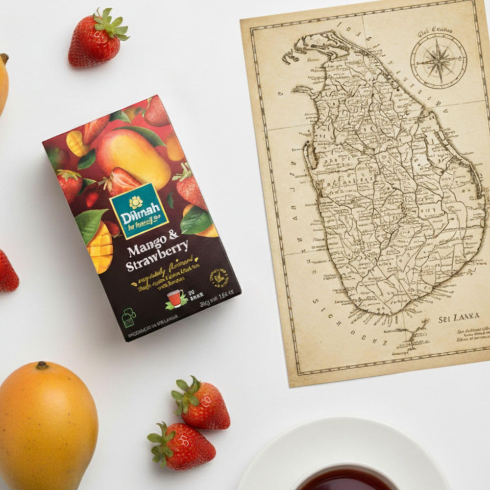 Dilmah glass of iced mango strawberry tea poured over ice for refreshing sip