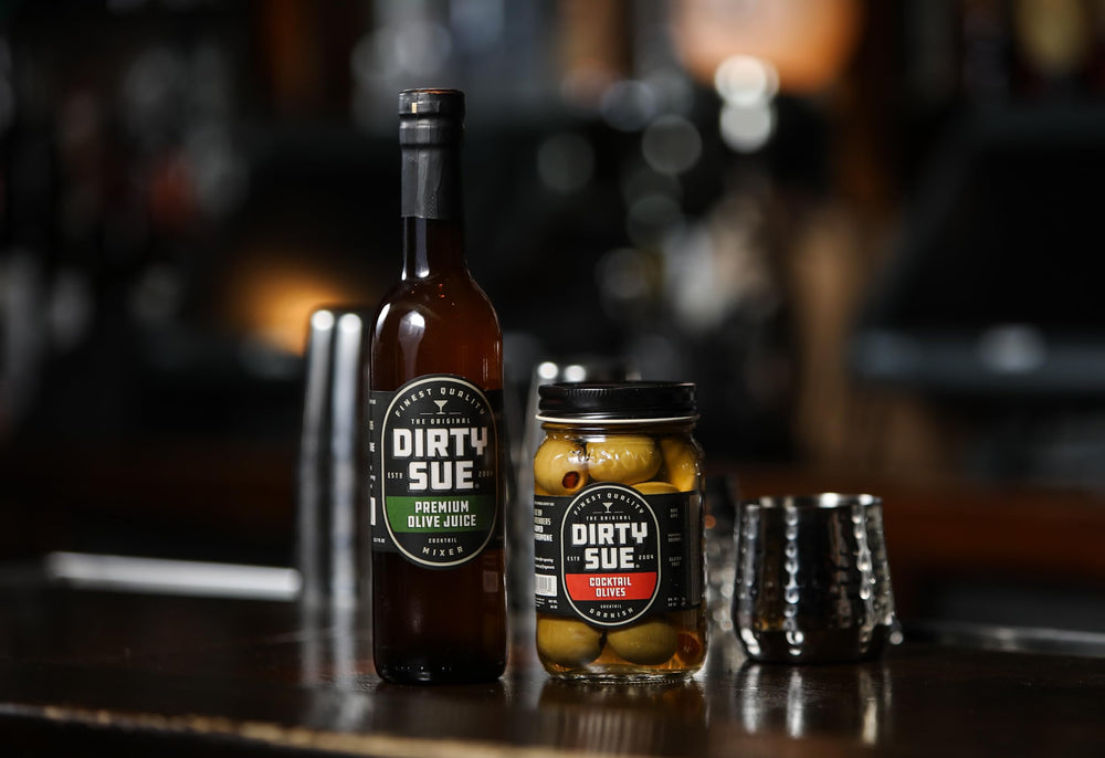 Dirty Sue martini with olive showcasing enhanced flavor and presentation