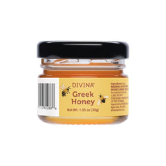 Divina spread on spoon showing glossy sour cherry texture and flavor boost