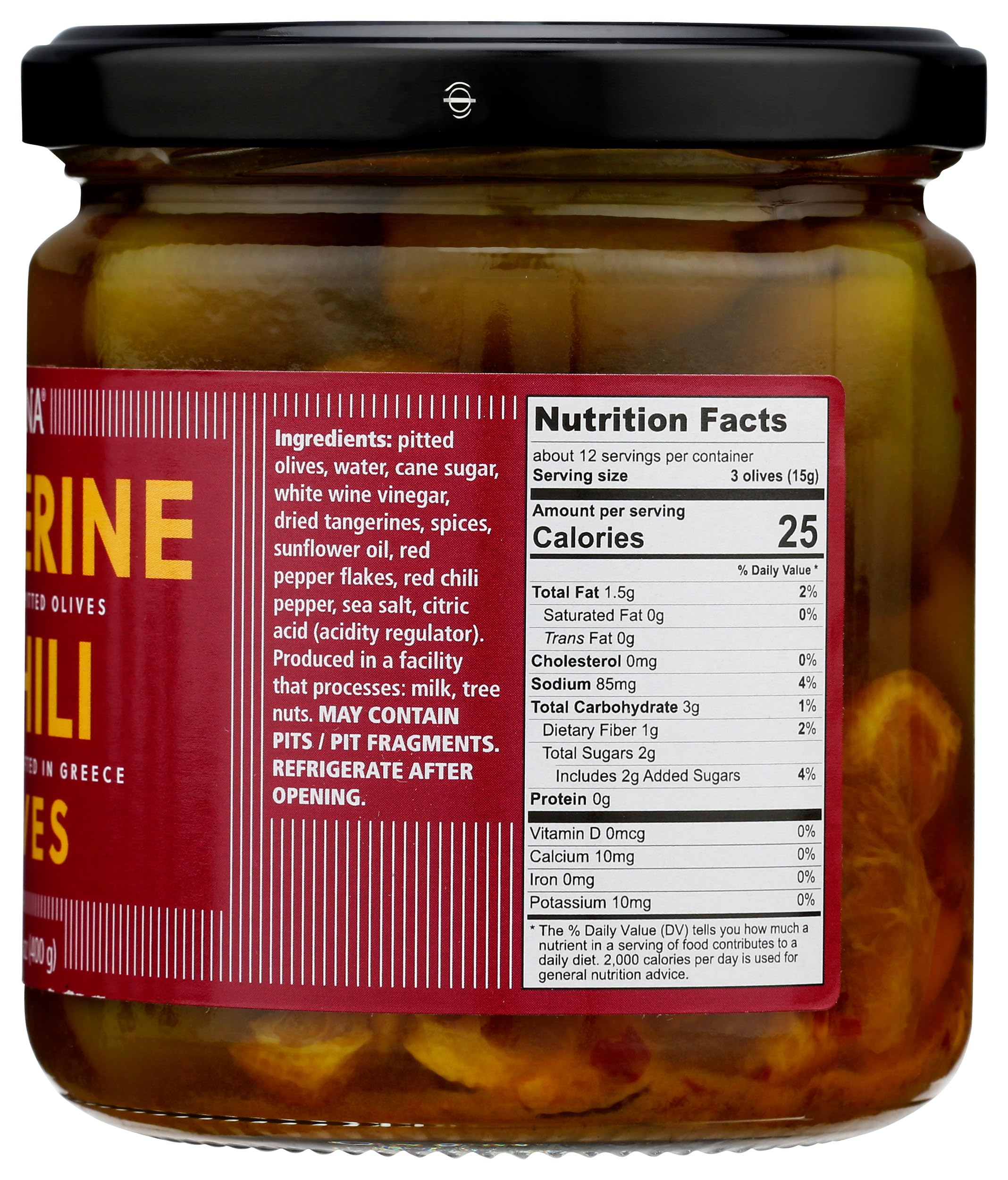 Divina jar beside spoon demonstrating scale and easy serving convenience