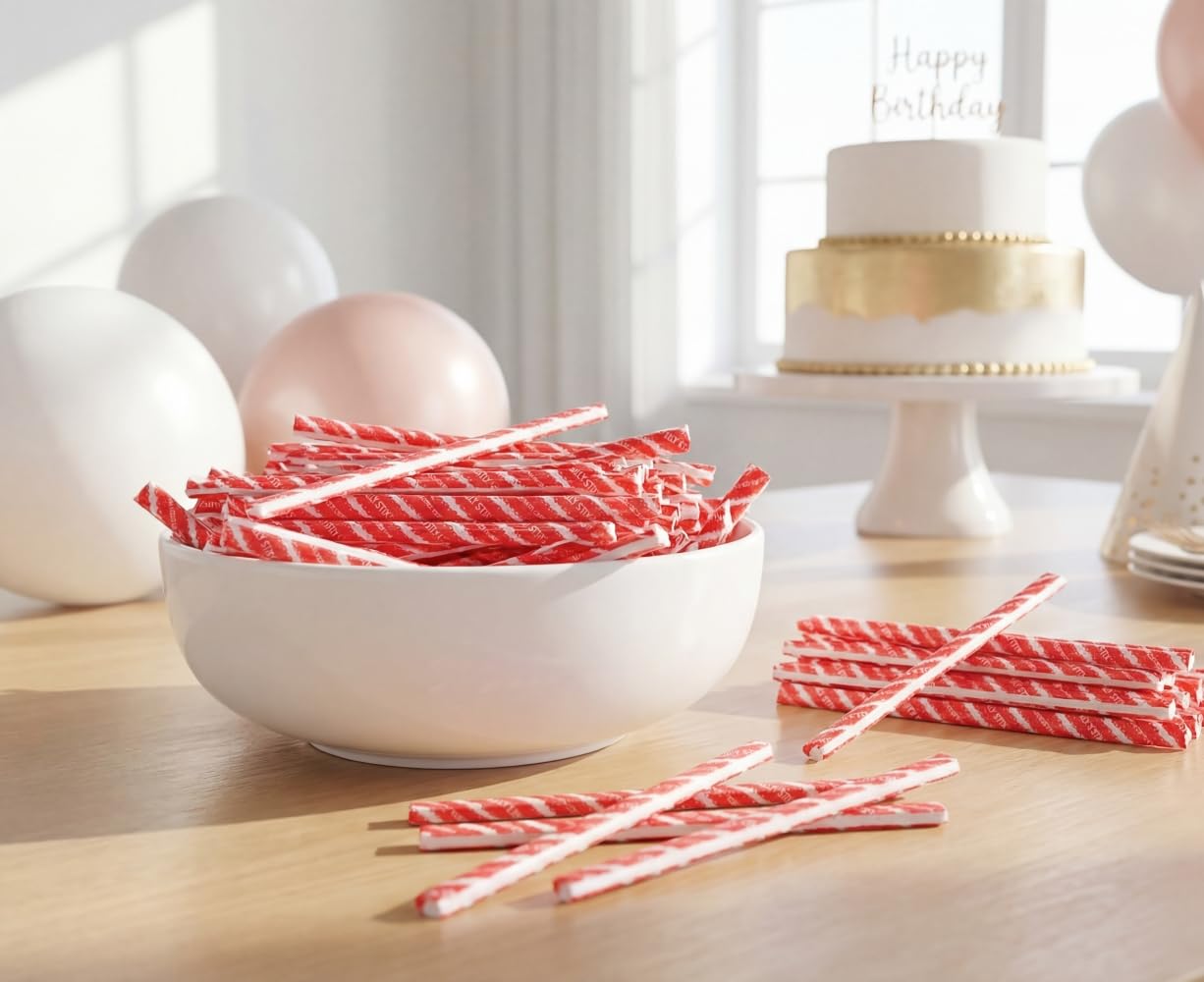 DM Sweets straw held in hand showing size and single-serve convenience