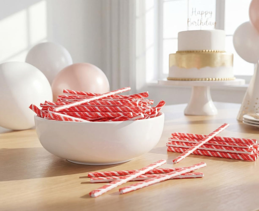 DM Sweets straw held in hand showing size and single-serve convenience