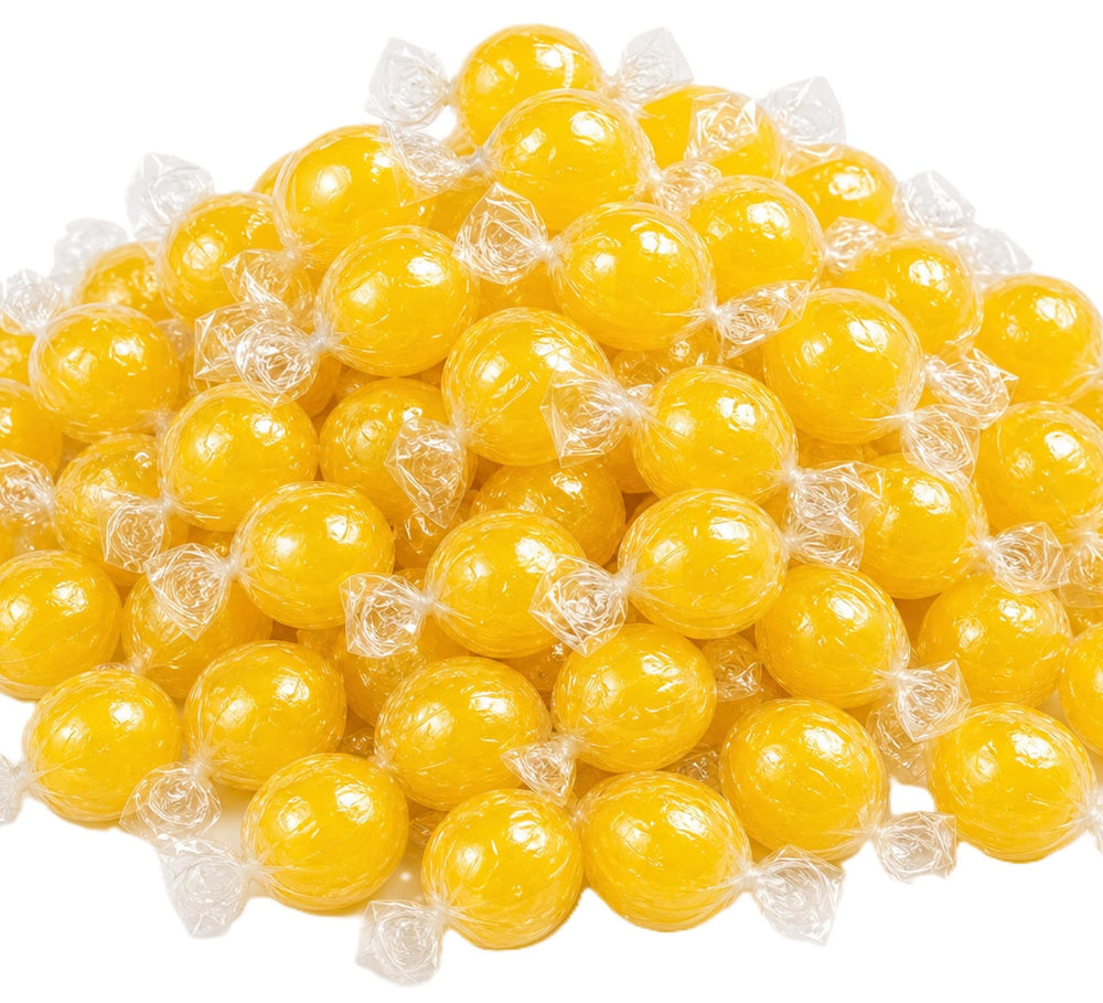 DM Sweets front pack showing jumbo lemon balls and bright yellow appeal
