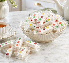 DM Sweets close-up of nougat texture showing creamy chew and fruit bits