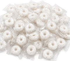 DM Sweets front of bag showing orange mints and branding, clear shelf-ready packaging benefit