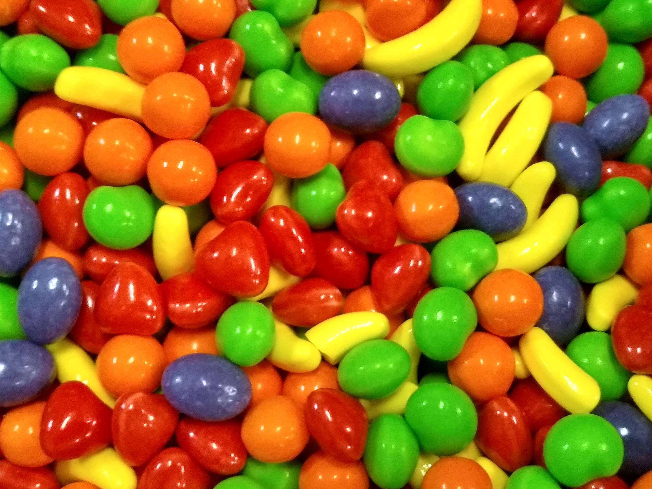 DM Sweets spoon in bowl display indicating effortless candy refills