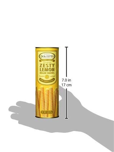 dolcetto wafers beside a cup of tea on a table, bright lemon flavor enhances beverage pairing