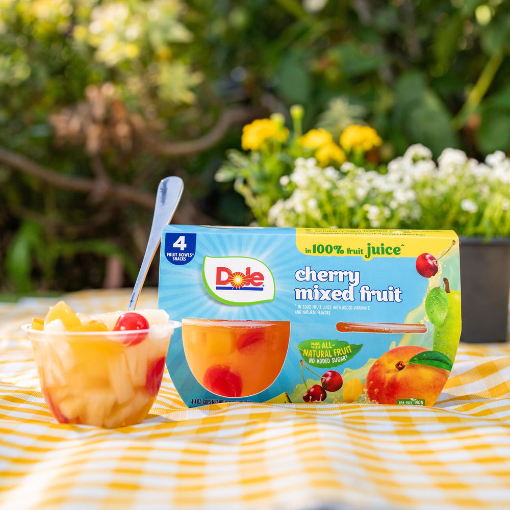 Dole cup held in hand for scale showing 4oz single-serve portion, perfect portion control